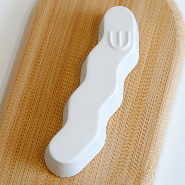 Original Mezuzah case design - clean geometric lines, pop Zig Zag shape, molded in clay, sealed in off-white glaze.  Inspired by pop art, and 80's style, this is a minimalist sophisticated addition to your home entrance and indoor openings.