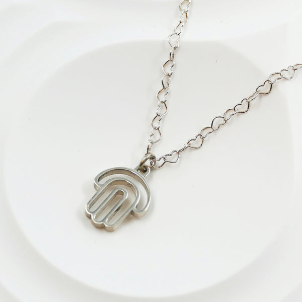 Hamsa pendant made of silver by Armadillo judaica