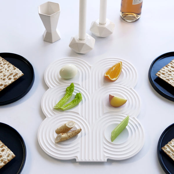 minimalist seder table with corian seder plate