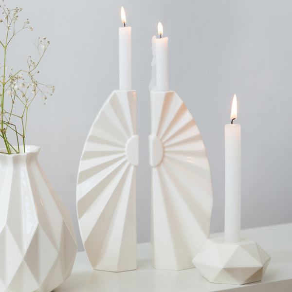A pair of white modern candlesticks for Shabbat