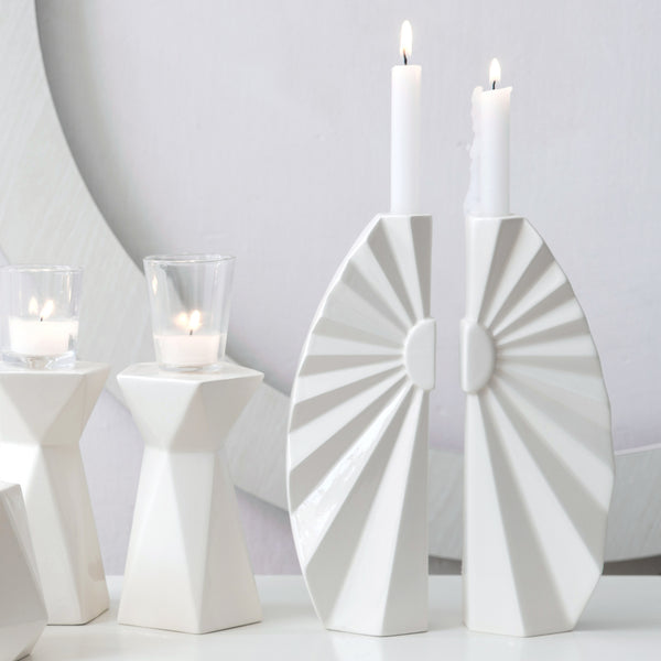 Shabbat candleholders designed in origami style